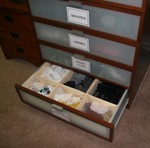Sox boxs in two different sizes are in place in this sock drawer.