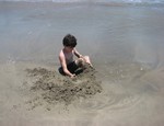 Tristan getting more sunburnt on a Mexican beach just south of Acapulco.