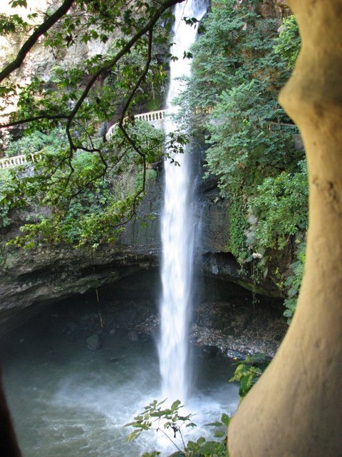 Another view. Swallows nest in the rocks around the pool and fly endlessly through the mist from the spray.