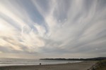 Wind-swept clouds on the beach.