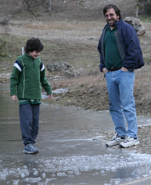 Peter watches while Tristan stands on water.