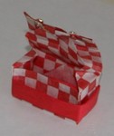 Matt's box

BTW, the bulk of the box is made from a single sheet of food wrapper from Matt's pizza and pasta shop.  The torsion ring is made from matching tissue paper.