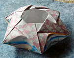 Hexagonal coaster bowl folded by John Andrisan from a different paper of his design.