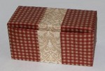Large Hinged Box.   Oct 2006.  Designed and folded by Rosemary LYNDALL WEMM
The lid tucks behind flaps inside the front of the box.  It stays closed but there is a small gap between the lid and the front of the box.