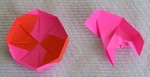 OCTAGONAL BOX LID: D07
 
FROM:  4 square sheets in diamond orientation

VIEW: Inside of completed lid and completed unit from same perspective.