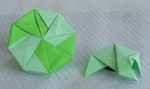 OCTAGONAL BOX LID: D09 

FROM:  4 square sheets in diamond orientation

VIEW: Outside view of completed lid and completed unit from same perspective.